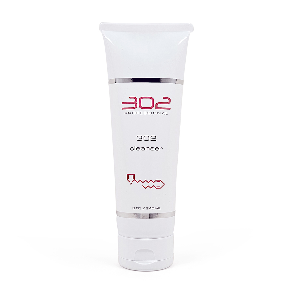 White cosmetic tube labeled '302 cleanser' with silver bands, standing upright.