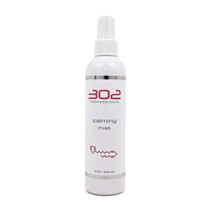 White spray bottle labeled '302 Professional' with 'calming mist' on the front and a spray nozzle (8 oz / 240 ml).