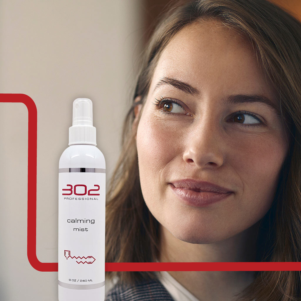 CALMING-MIST-8OZ_WOMAN_3_1024x1024_72 | 302 Professional Skincare White spray bottle labeled '302 Professional calming mist' beside a woman's face with a red graphic frame outline.