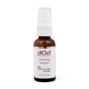 Brown glass spray bottle with white pump labeled '302 Professional firming serum', contains 1 fl oz (30 ml)