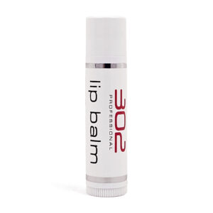 Lip balm stick with white cap and label reading 'lip balm' and '302' on white background, upright product photo.
