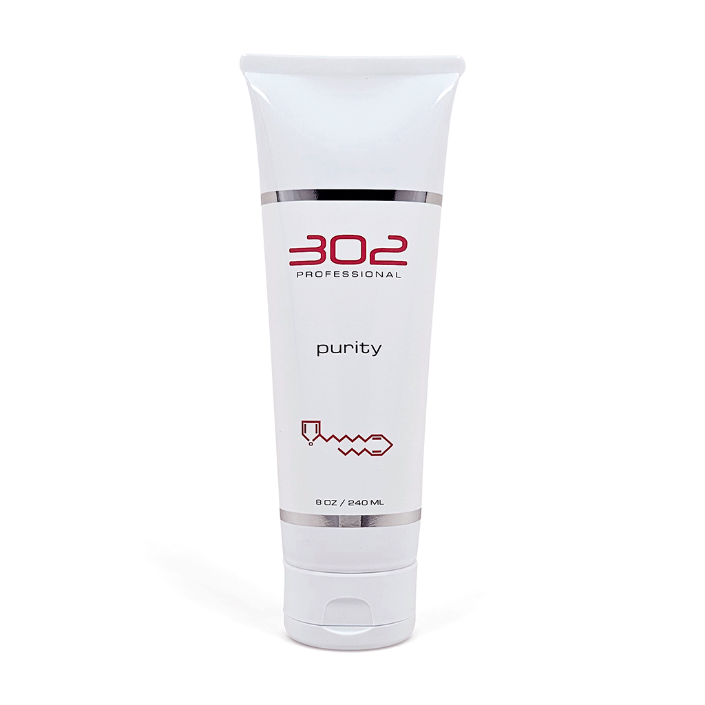 White squeeze tube labeled '302 Professional' with 'purity' text, standing upright against a white background.