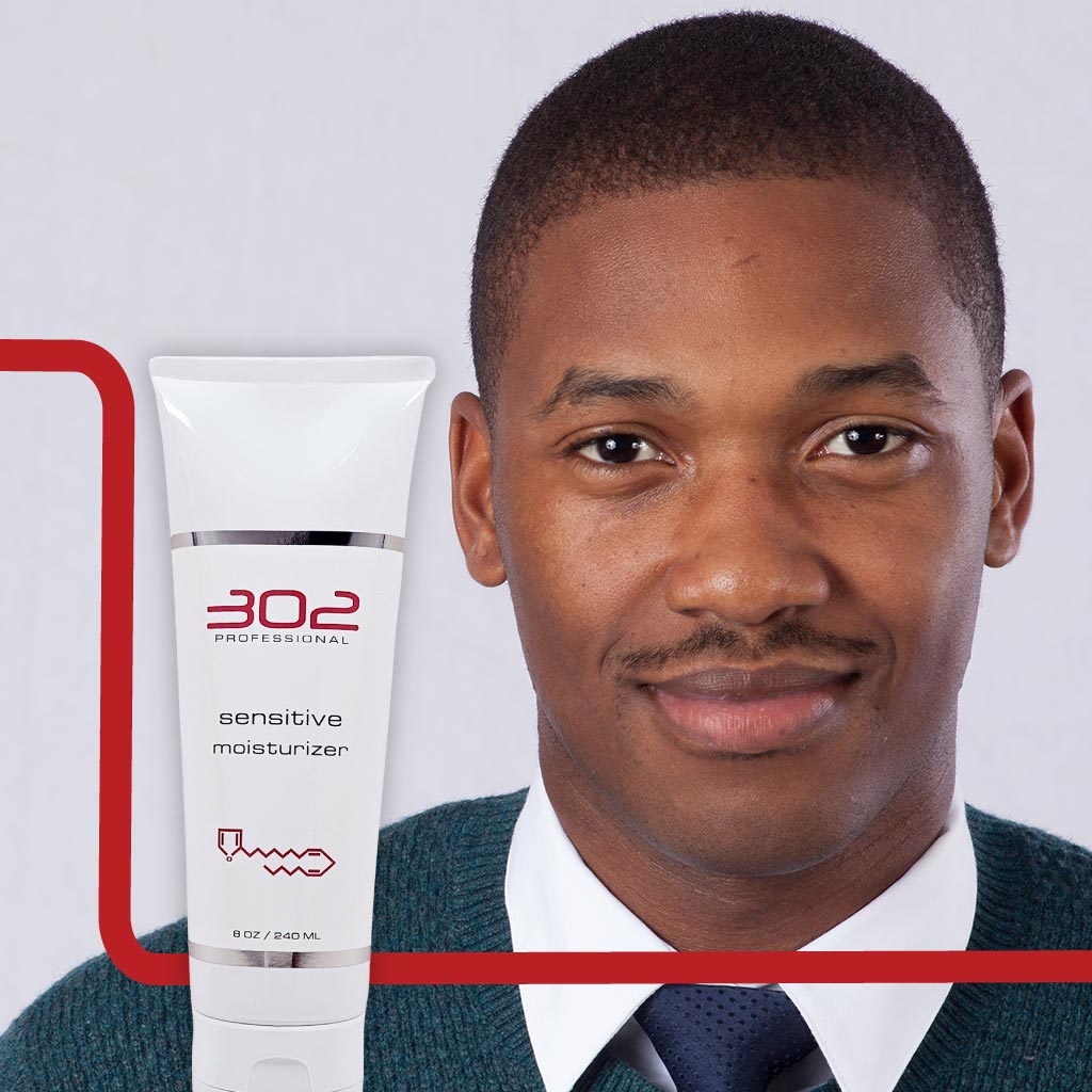SENSITIVE-MOISTURIZER-8OZ_MAN_1_1024x1024_72 | 302 Professional Skincare Portrait of a man in a teal sweater and white shirt beside a tube labeled '302 Professional Sensitive Moisturizer' (advertising image).